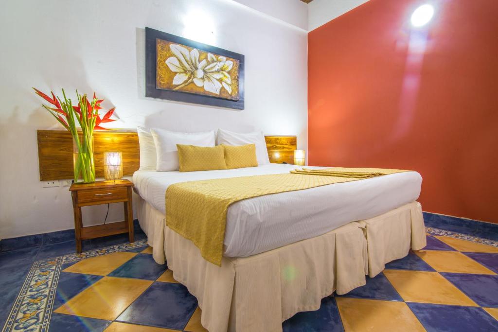 Postel nebo postele na pokoji v ubytování Hotel 3 Banderas