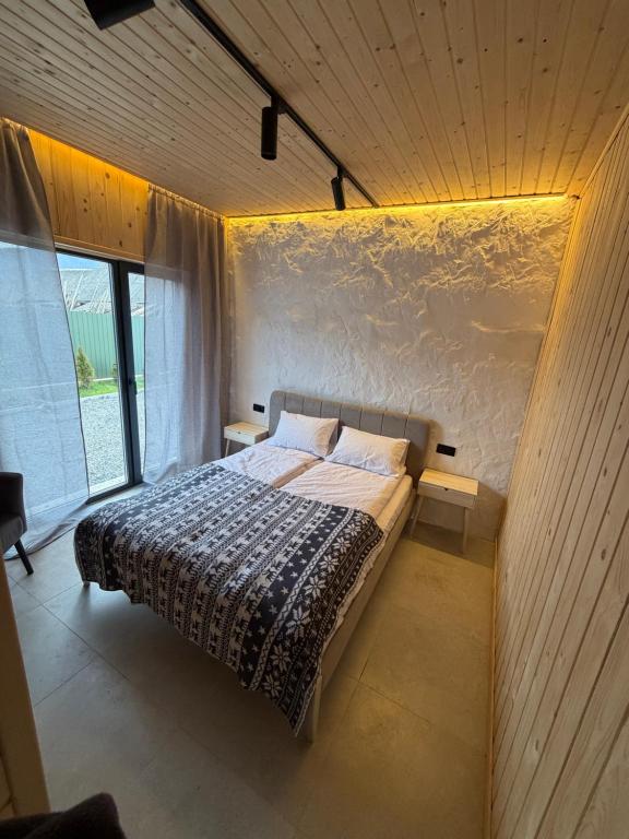 Postel nebo postele na pokoji v ubytování Family Rest Village