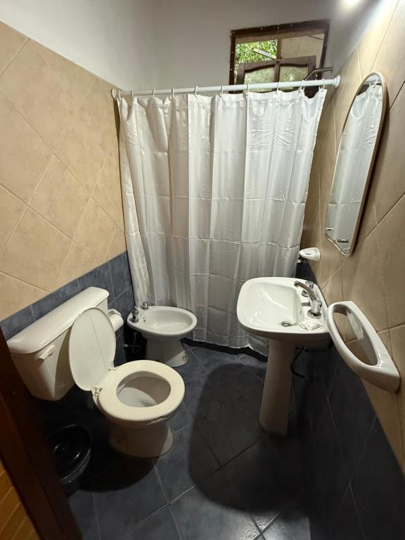 Ein Badezimmer in der Unterkunft Cabañas La Cautiva