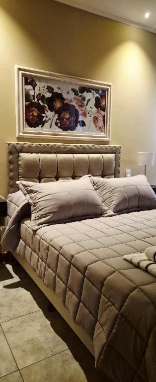 En eller flere senge i et værelse på Modern apartment in Azul, comfort and style with patio