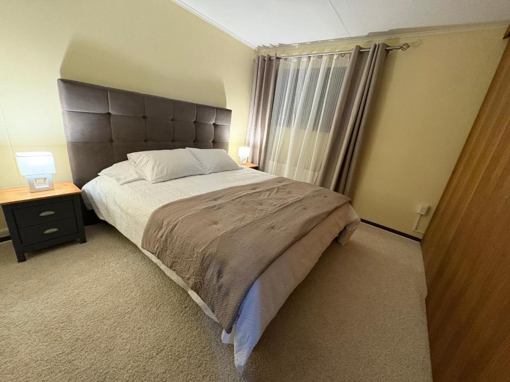 Postel nebo postele na pokoji v ubytování Hostal Mundet