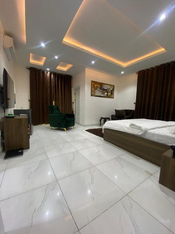 Ένα ή περισσότερα κρεβάτια σε δωμάτιο στο Elite Luxe