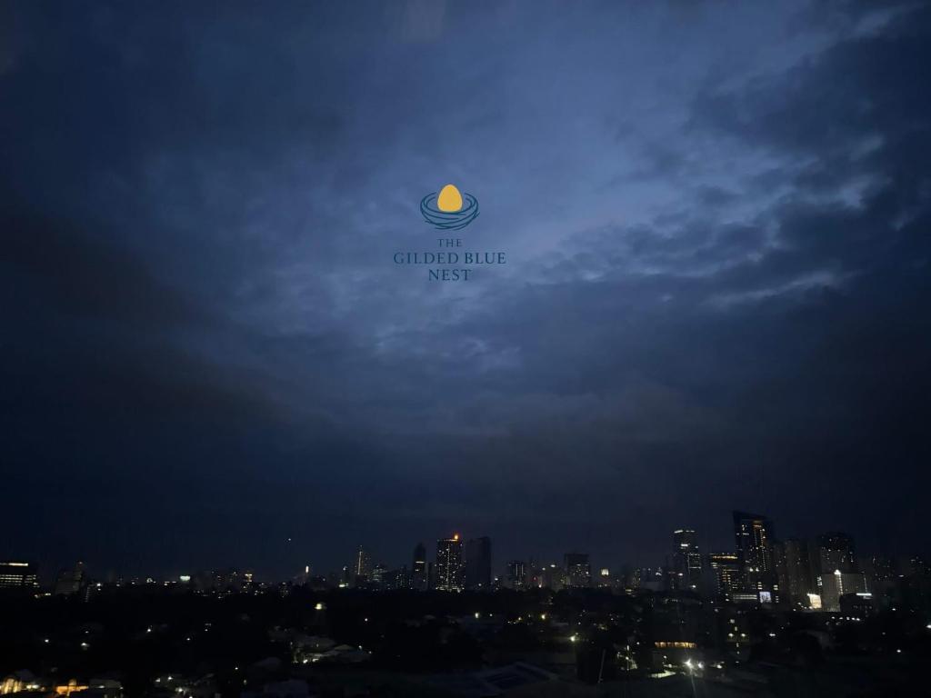 a view of the chicago bubble sign in the sky at The Gilded Blue Nest in Mandaue City
