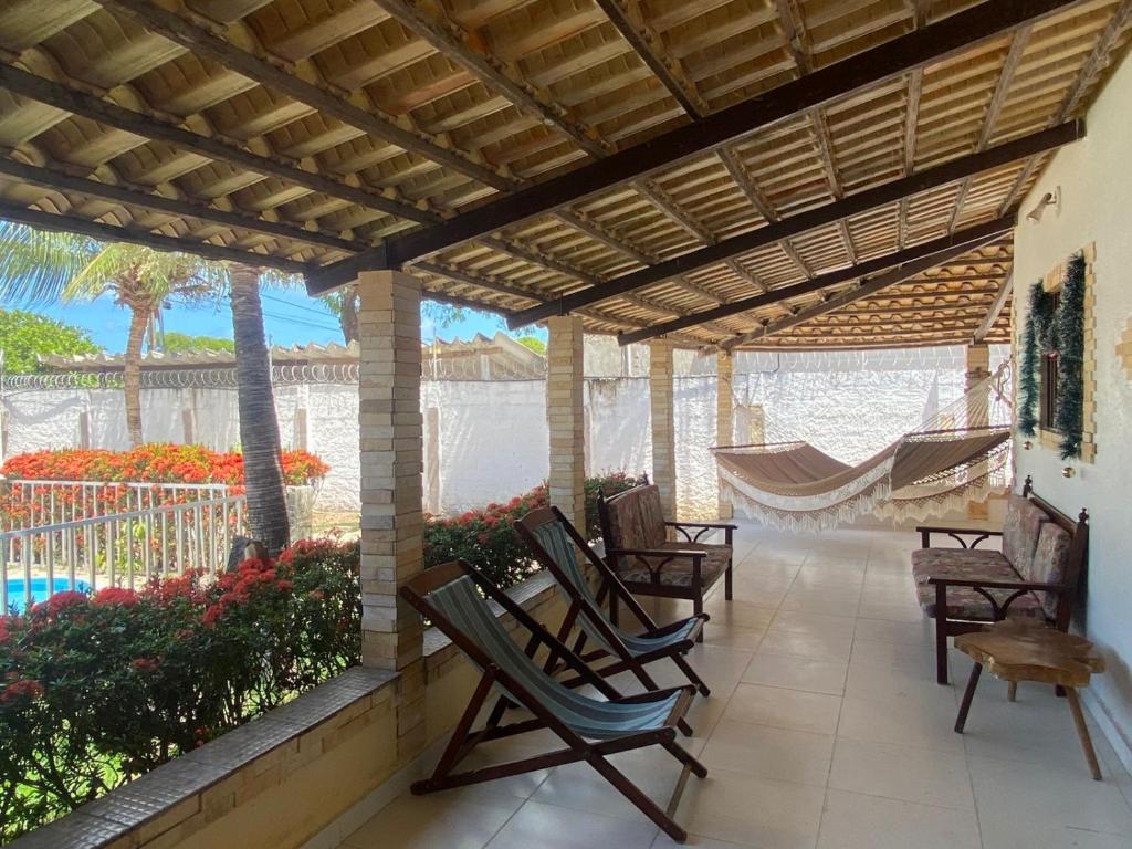 En balkon eller terrasse på SM Homestay - Casa Jacumã