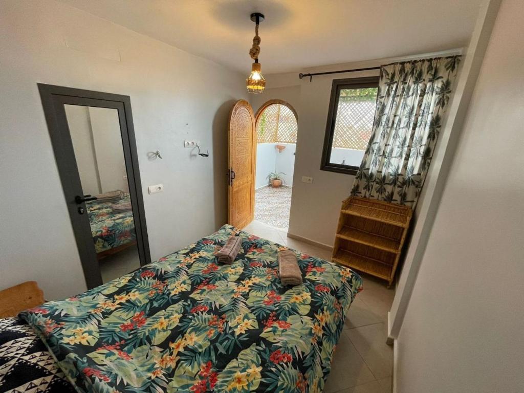 Postel nebo postele na pokoji v ubytování summerhouseberber