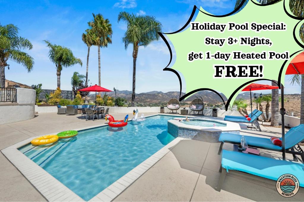 a pool at a resort with a sign that says holiday pool special stay nights at Poway Panorama Peak in Poway