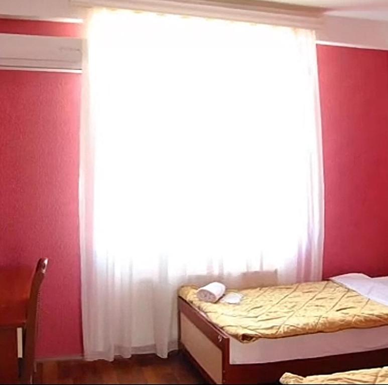 Кровать или кровати в номере Damiroff