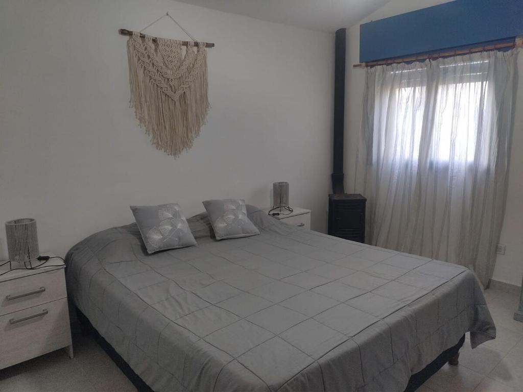 Postel nebo postele na pokoji v ubytování La Calma