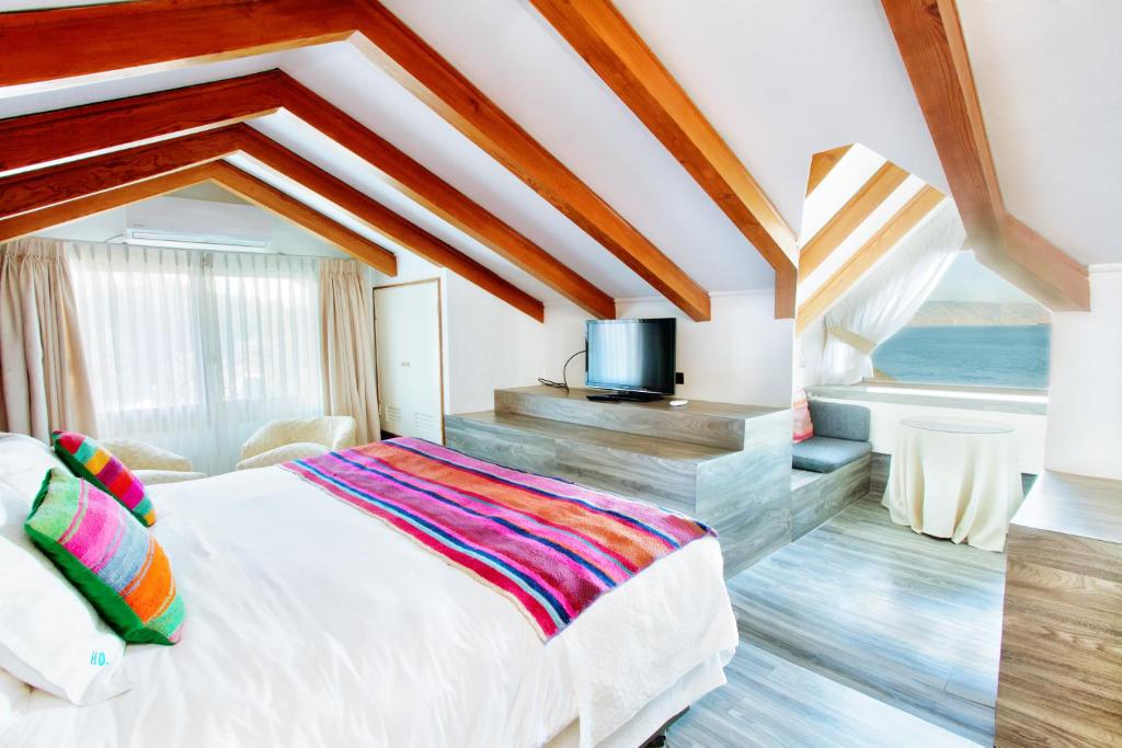 Uma cama ou camas num quarto em Hotel Oceanic