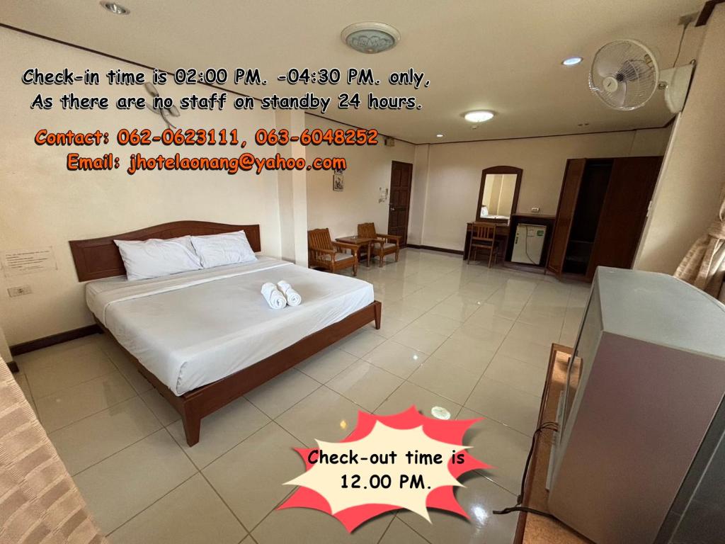 En eller flere senge i et værelse på J Hotel2