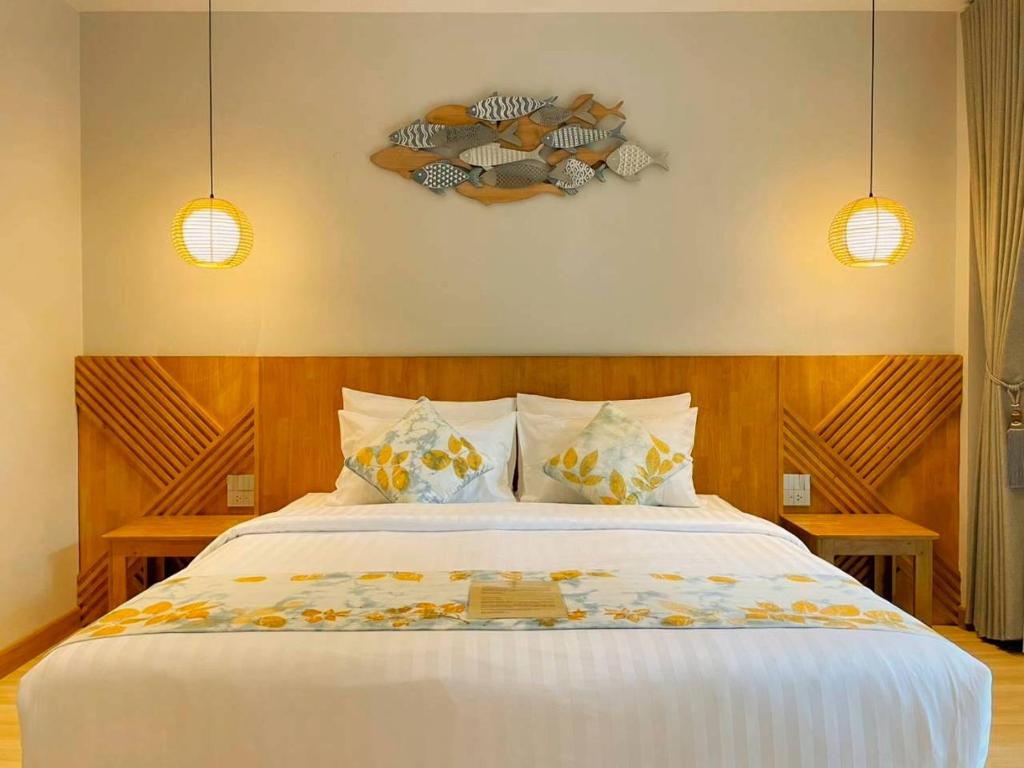 Postel nebo postele na pokoji v ubytování Secrest Boutique Kohtao Thailand