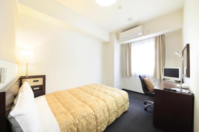 TV a/nebo společenská místnost v ubytování Fuchu Urban Hotel Annex