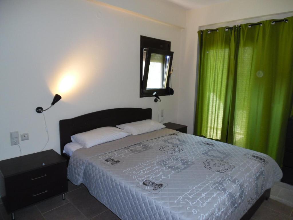 Postel nebo postele na pokoji v ubytování Artemis Appartments