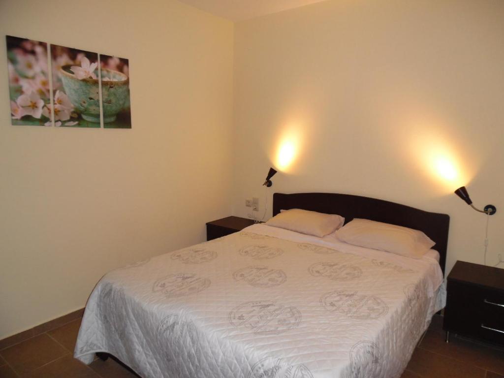 Postel nebo postele na pokoji v ubytování Artemis Appartments