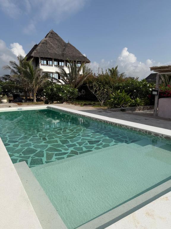 Bazén v ubytování Waridi Room at Lulu Sands nebo v jeho okolí