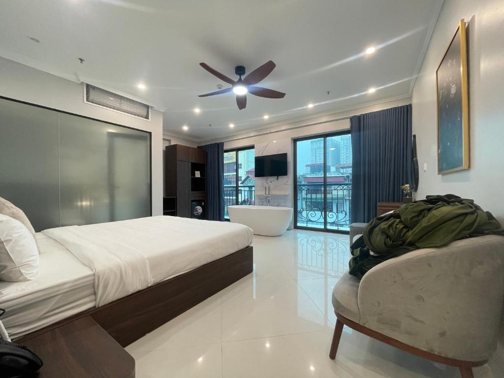 Postel nebo postele na pokoji v ubytování Diamond Light Hotel