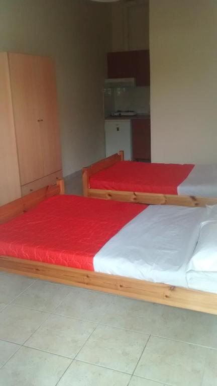 Łóżko lub łóżka w pokoju w obiekcie Apartments Christina