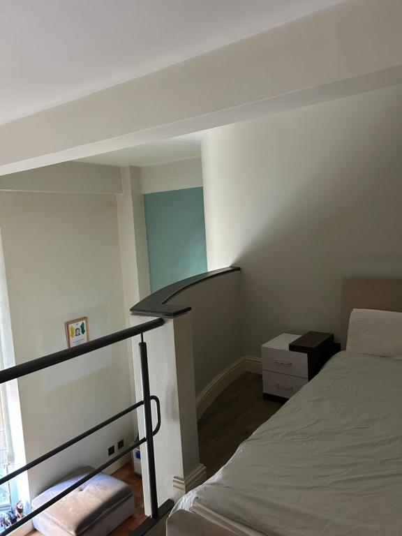 En eller flere senge i et værelse på 312 Mutual Heights Building