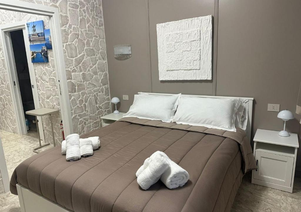 Postel nebo postele na pokoji v ubytování Stone House