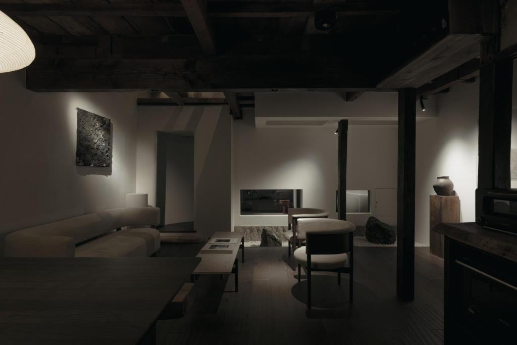 a living room with a couch and a table at Haku-ma 白間 in Kanazawa