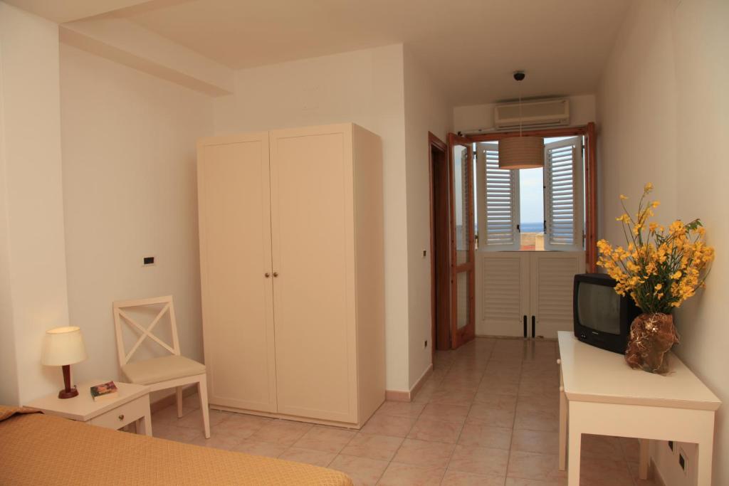 Postel nebo postele na pokoji v ubytování Hotel Amarea - Aeolian Charme