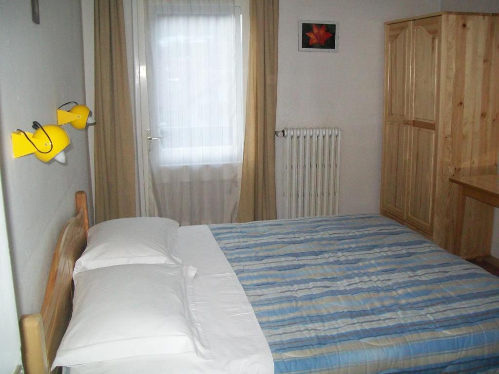 Postel nebo postele na pokoji v ubytování Verda Val