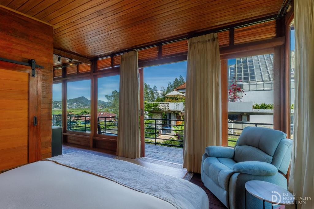 Postel nebo postele na pokoji v ubytování Alamu Eco Lodge