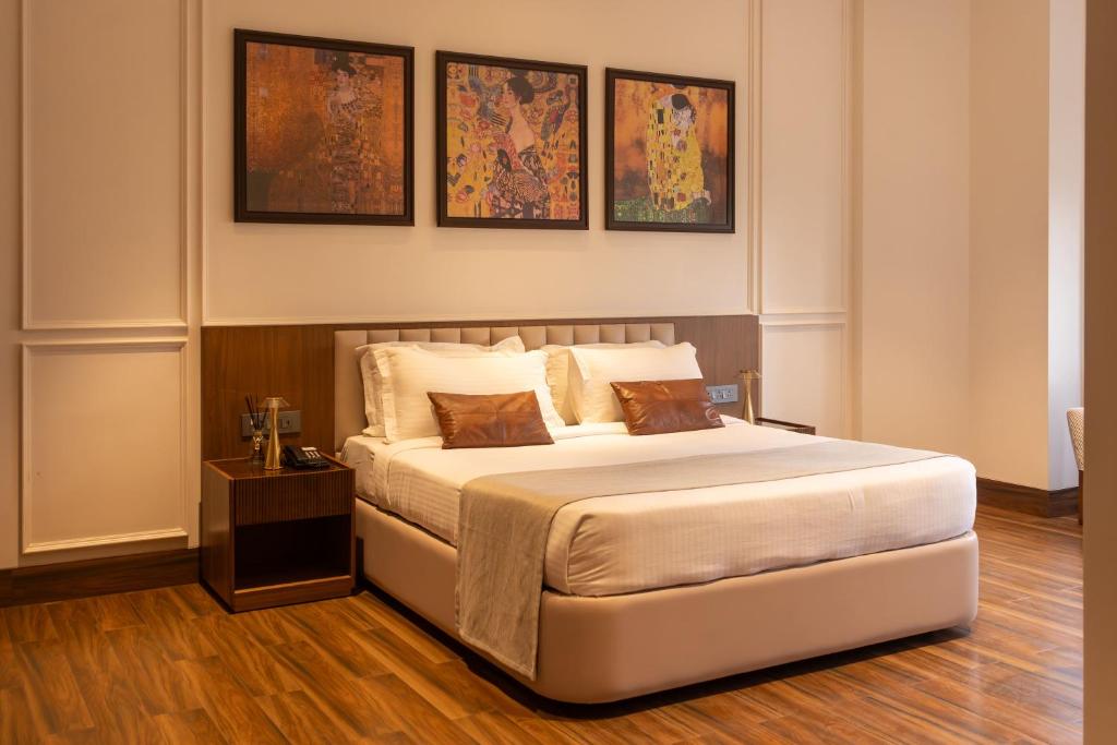 Postel nebo postele na pokoji v ubytování Park Suites