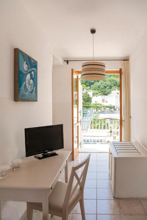 TV a/nebo společenská místnost v ubytování Hotel Amarea - Aeolian Charme