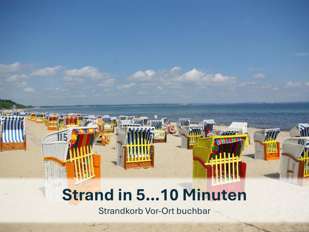 a group of chairs and tables on the beach at Heringsdorf, Ferienwohnung Hanni in Heringsdorf