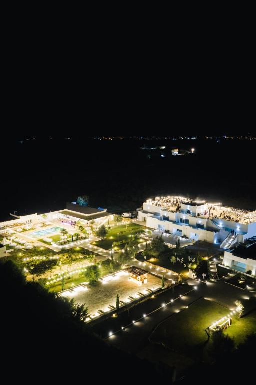 a view of a parking lot at night at Cantine De Mare - Wine and Resort in Cirò Marina