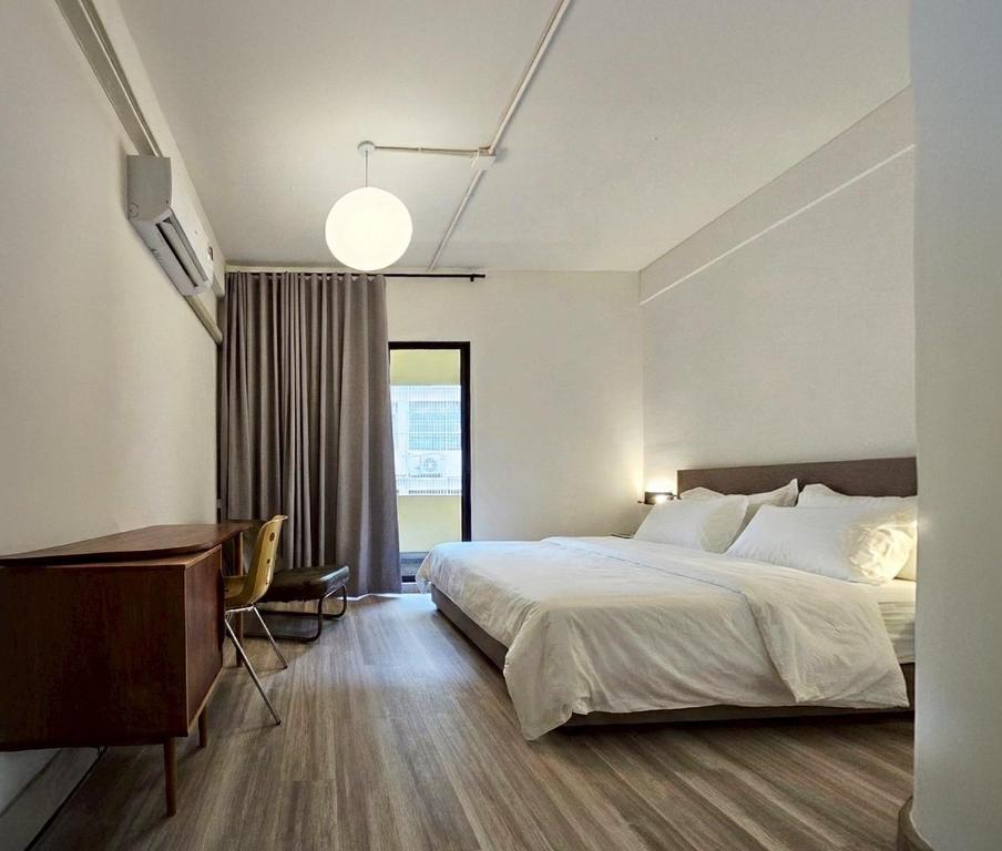 Ένα ή περισσότερα κρεβάτια σε δωμάτιο στο Brown H