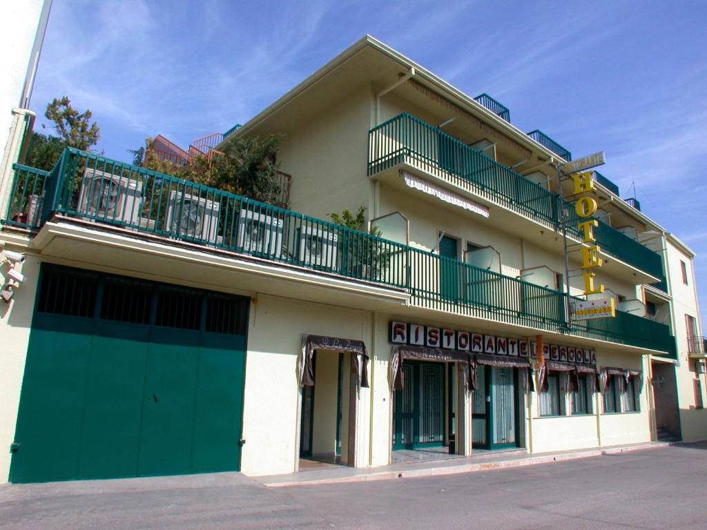 a building with a balcony on top of it at Hotel La Pergola in Rionero in Vulture