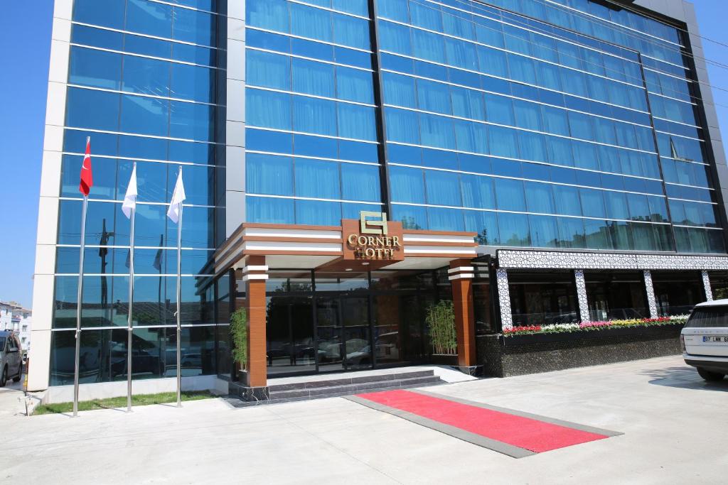 a building with a sign that reads south city at The Corner Hotel in Sincan