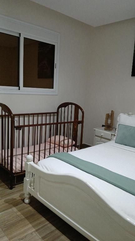 Postel nebo postele na pokoji v ubytování Moga Haven