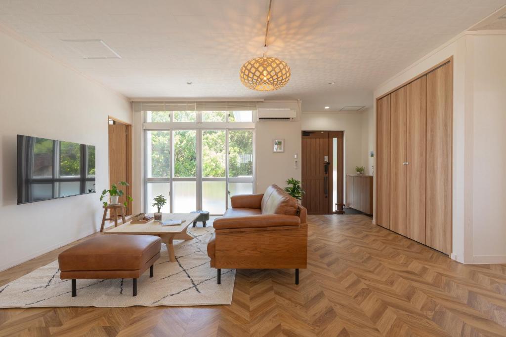 Телевизор и/или развлекательный центр в 栞-shiori-FUNAKURA