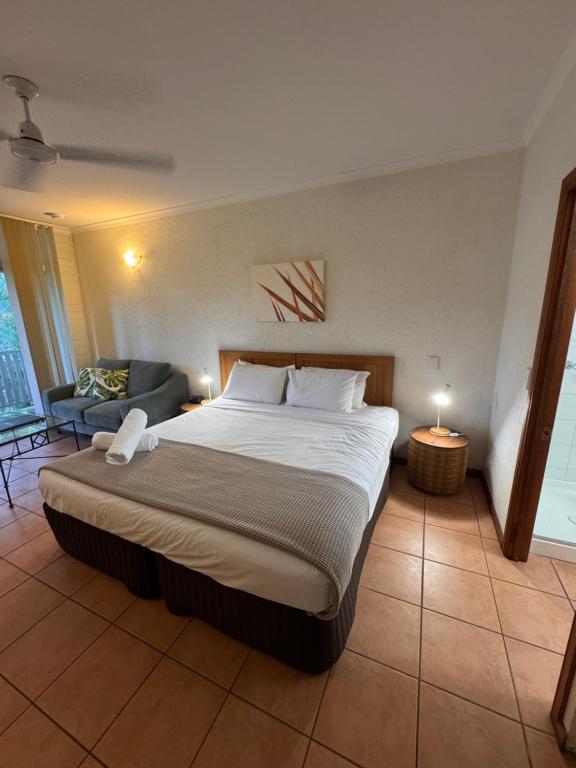 Postel nebo postele na pokoji v ubytování Barefoot Retreat Port Douglas