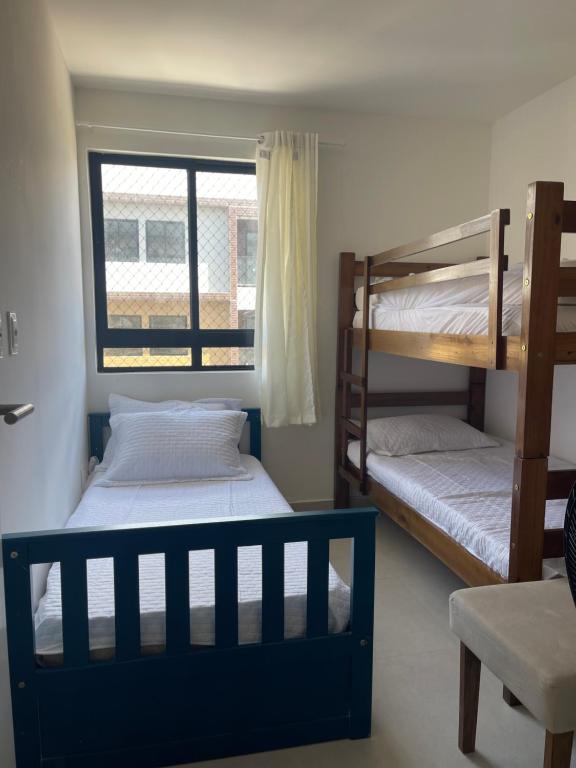 En eller flere senge i et værelse på Apartamento Vista mar