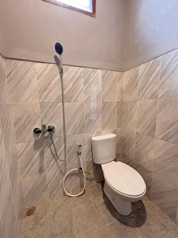 Afbeelding uit fotogalerij van druma Roomstay in Tanjungredep