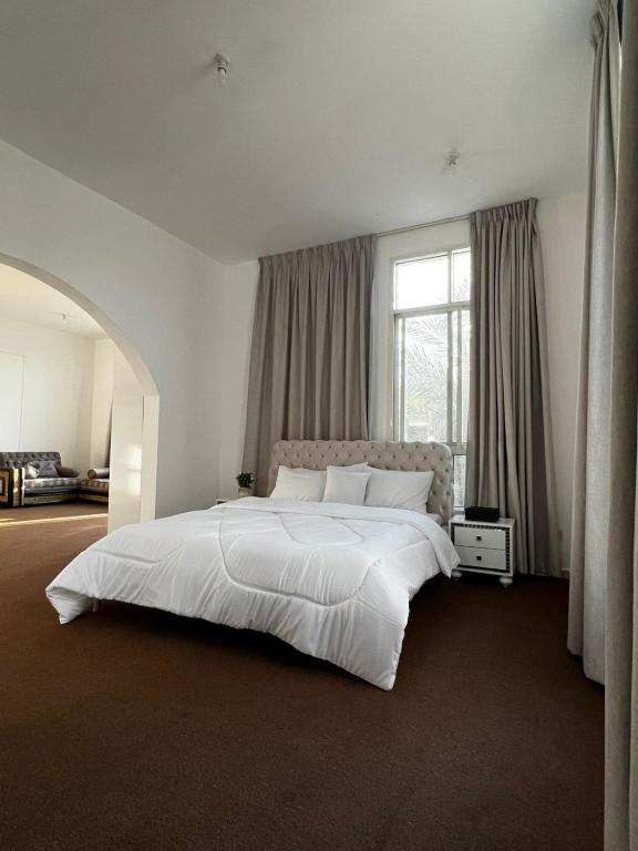 Кровать или кровати в номере Suite Room Khalifa A1