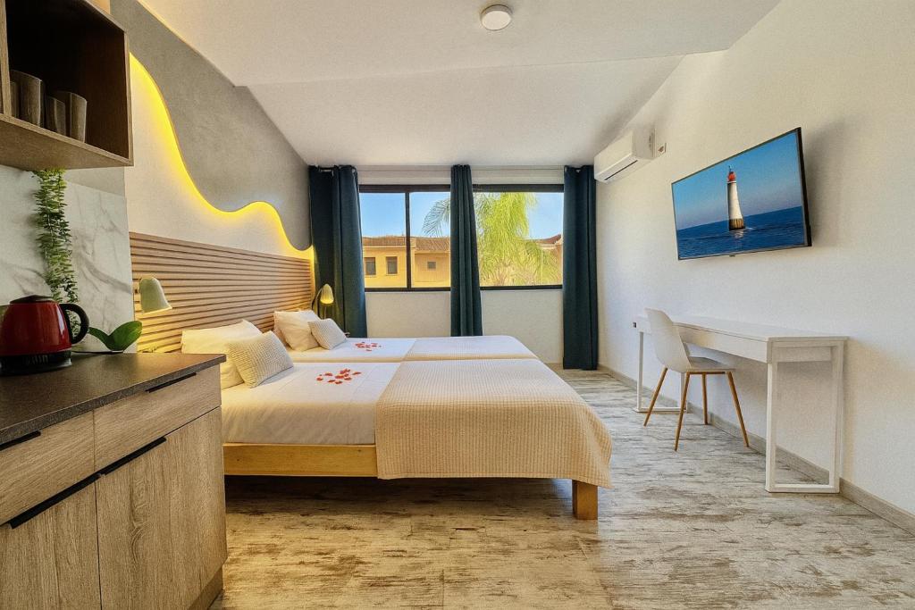 En eller flere senge i et værelse på Concept Rooms