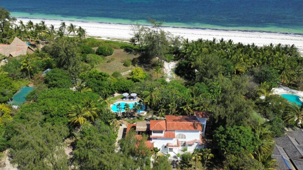 an aerial view of a house and the beach at Sandbox in Kilifi