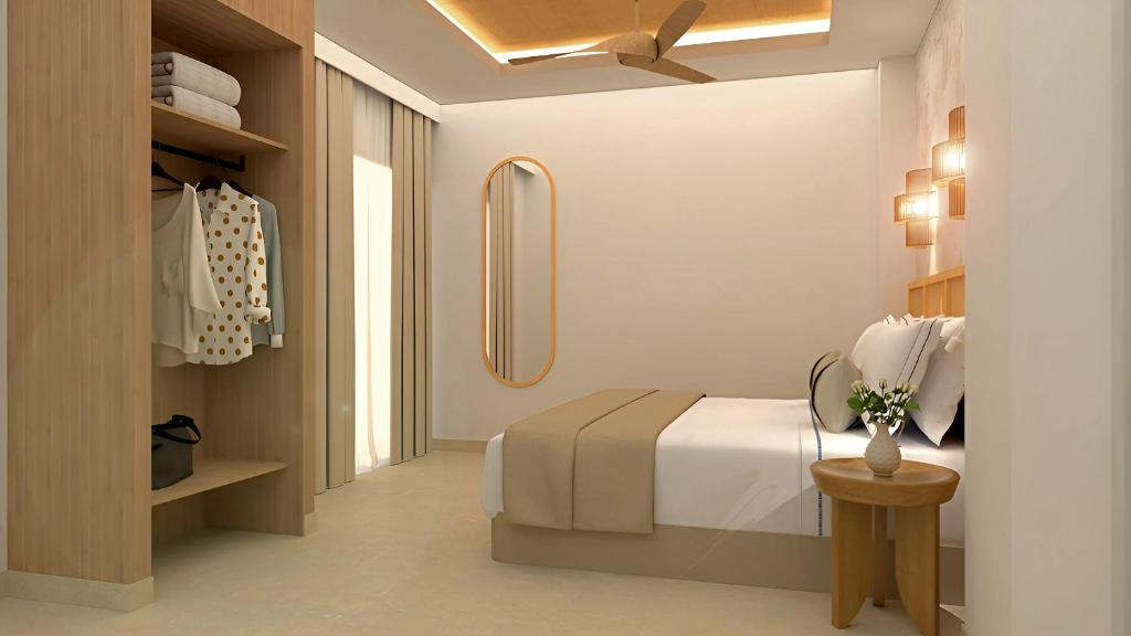 En eller flere senge i et værelse på Hotel Urania Arenal - Adults Recommended