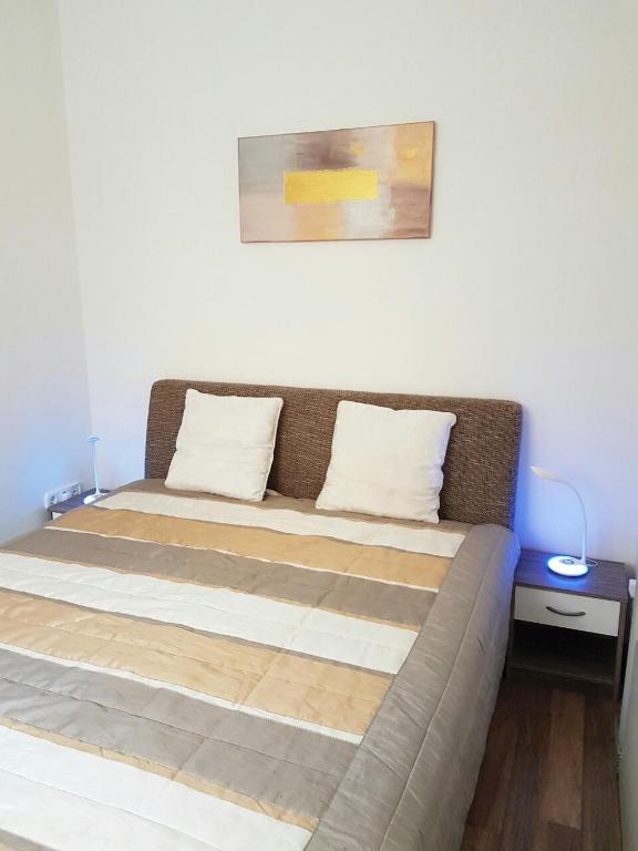 Posteľ alebo postele v izbe v ubytovaní Best Hévíz Apartman