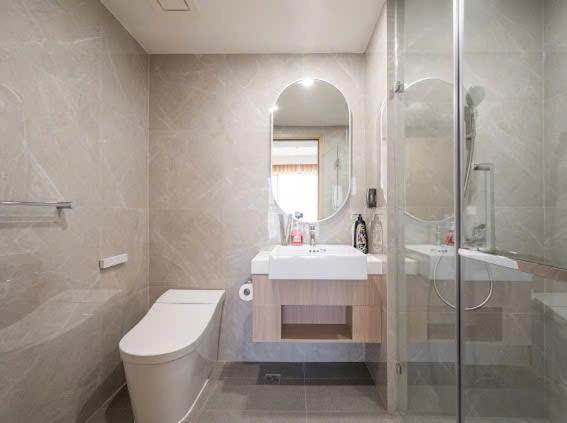 a bathroom with a sink and a toilet and a mirror at Vinhomes Grand Park 2 PN Masteri Centre Point view Công viên in Long Bình