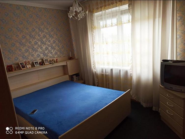 TV a/nebo společenská místnost v ubytování Apartamentas