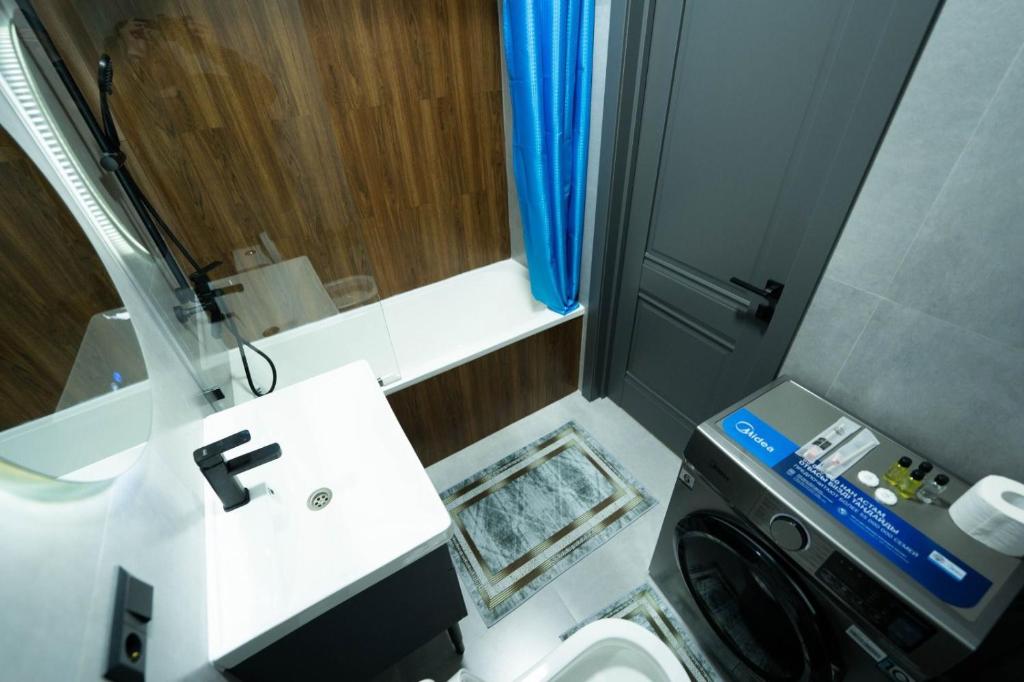 Koupelna v ubytování Самый центр в Алматы рядом с метро