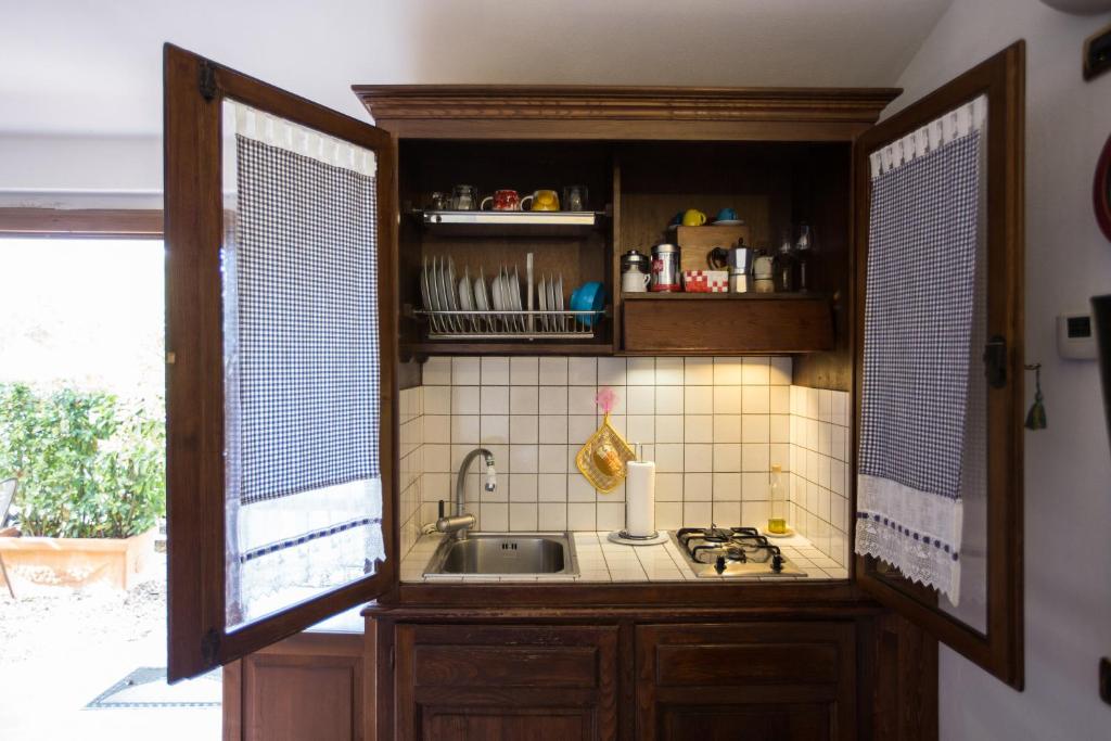 Kuchyň nebo kuchyňský kout v ubytování Antica Fonte Residenza di Siena