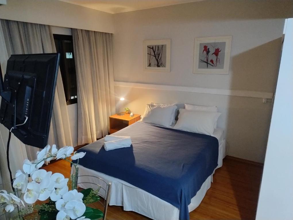 Postel nebo postele na pokoji v ubytování Hotel Slaviero Moema GrandFlats Suíte Master Luxo II