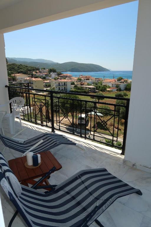 a balcony with a view of the ocean at Finikounda in Finikounta